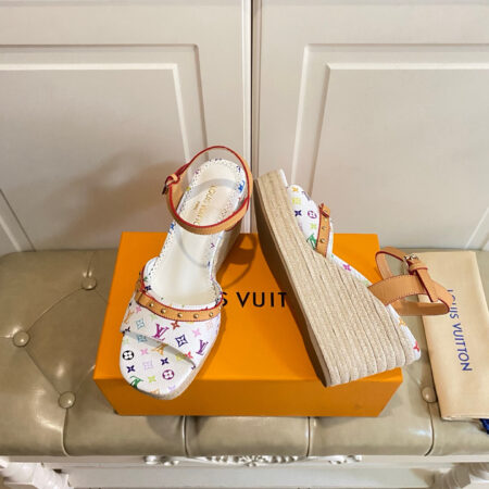 LOUIS VUITTON Wedge straw sandals